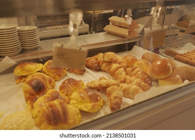 Pastries, Rolls And Bread  Inside Of A Bakery Case 