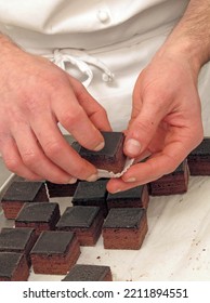 Pastry Chef Hands Preparing And Making Chocolate Sweets