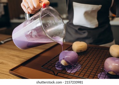 Pastry Chef In The Kitchen Decorating A Cake Of Chocolate,fruit,candies,Confectioner Is Decorating Chocolate Cake,cooking Class, Culinary, Bakery, Food And People Concept