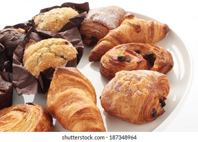 Pastry And Cup Cake Selection Isolated On White Platter