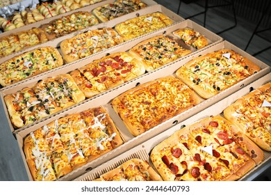 Pastry, pizza and snacks assorted, close up - Powered by Shutterstock