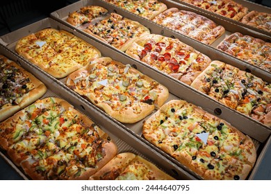 Pastry, pizza and snacks assorted, close up - Powered by Shutterstock