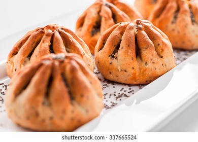 Pastry Shell With Chia Seeds On White Plate, White Background