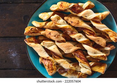 Pastry sticks stuffed with cheese,mustard and bacon.Selective focus on the front pastry - Powered by Shutterstock