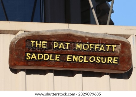 The Pat Moffatt Saddle Enclosure sign at the Esk Racecourse 
