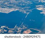 Patapsco River near Baltimore, Maryland, aerial landscape view of Francis Scott Key Bridge where parts collapsed on March 26, 2024 after container ship Dali stroked the bridge