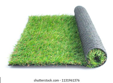 Patch Of Green Artificial Grass On A White Background