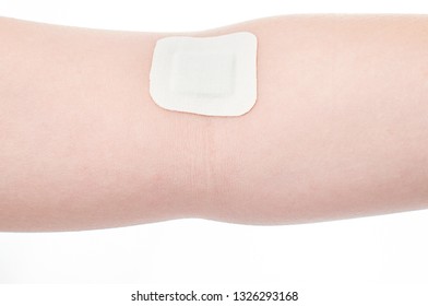 The Patch On The Elbow After Giving Blood From A Vein. Concept For Hospitals, Laboratories, Donation Support