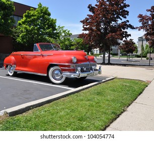 PATCHOGUE, NY - MAY 20: Parked 1948 Red Chrysler Convertible Is A Classic Collectible Vehicle. Chrysler Corporation Was Founded  In 1925 By Walter Chrysler. Patchogue,  NY May 20, 2012..