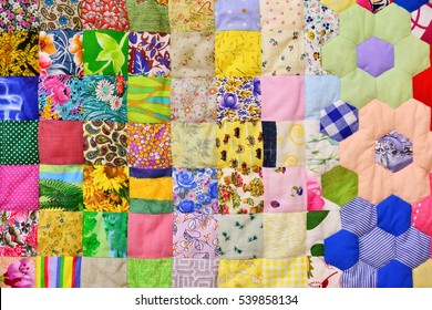 Patchwork quilt. Part of patchwork quilt as background. Flower print. Color blanket in style patchwork. Color blanket. Handmade. - Shutterstock ID 539858134