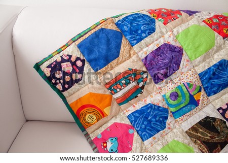 Patchwork quilt. Part of patchwork quilt as background. Handmade. Colorful blanket.