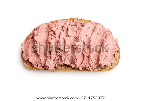 Pate on a slice of bread isolated on a white background.