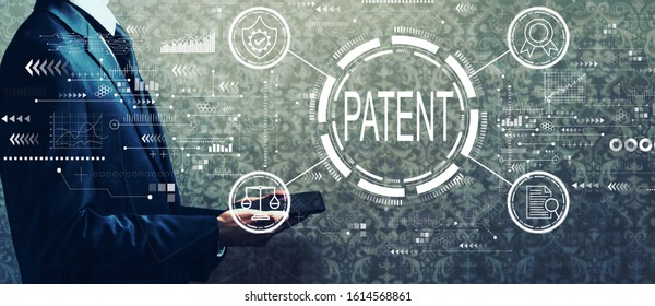 Patent concept with businessman holding a tablet computer