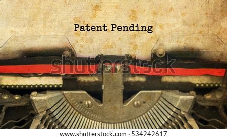 Patent Pending typed words on a vintage typewriter with vintage background                               