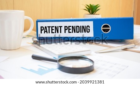 Patent Pending words on labels with document binders
