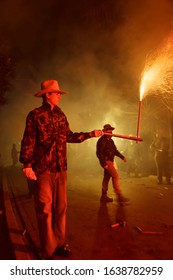 Paterna, Spain, 6,7,2012: People With Safety Clothes In Paterna With Fireworks In Their Hands