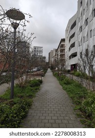 
Path, alley or alley of a new residential area, with natural park layout and flowers, in rainy, humid and cloudy weather, perfect place to live there in peace - Shutterstock ID 2278008313