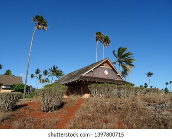 Path To Boarded-up Golf Pro Shop Surrounded By Coconut Trees On Molokai, Hawaii. 