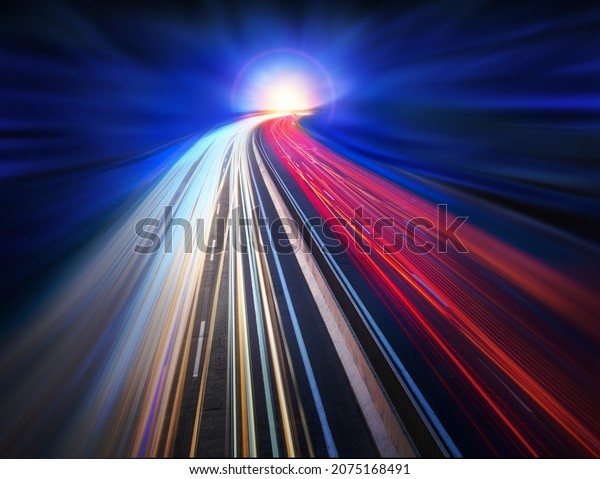 The\
path and light trails of cars on the night car road. Creative\
background design, motion and blur. Long\
exposure