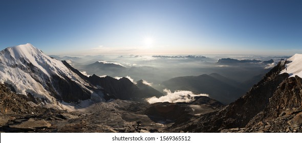 Path to Montblanc . View on refuges Gouter and Tete Rousse. On the left side you may see Aiguille de Bionnassay mountain. - Shutterstock ID 1569365512