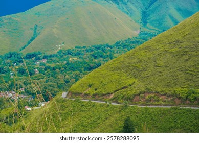 path on the side of a green hill 