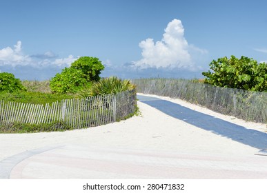 Path over sand dunes to the Atlantic Ocean in Miami, Florida