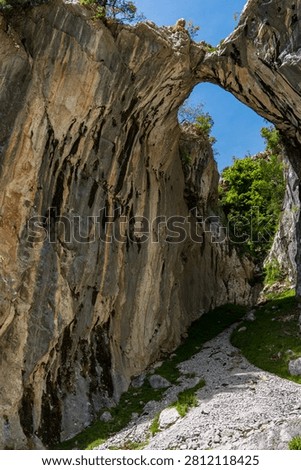 A path in an overhanging cave