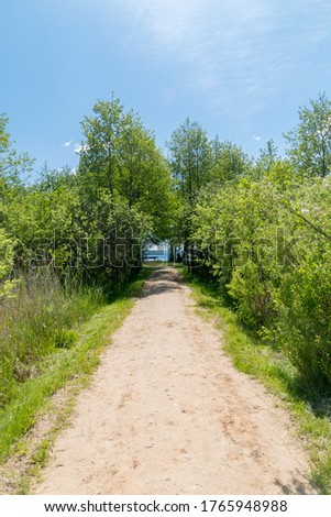 Similar – Zwei Menschen wandern auf einem Berg