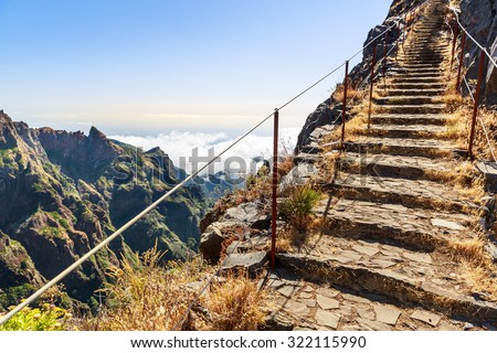 Path with steps and handrails in the mountains, Portugal, Madeira