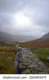 A Path That Travels Up The Mountains In Snowdonia 