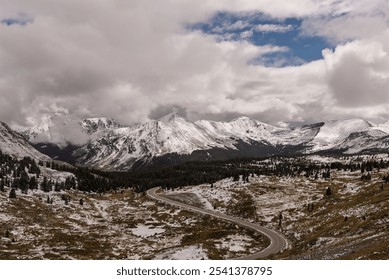 The Path Through Cottonwood Pass.  Snowcapped Peaks and Winding Roads, Colorado - Powered by Shutterstock