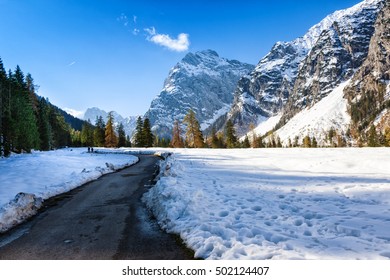 Path Through Early Winter Mountain Landscape. Snow Fall In The Late Autumn Season.