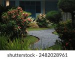 Path in tropical flower garden, Indonesia- June 28 2024