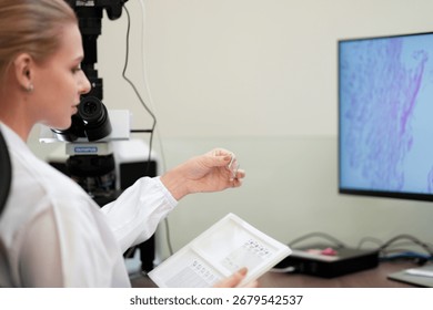 A pathologist performs a quality control check, comparing a physical glass slide with its whole slide image WSI on a digital pathology workstation for a final diagnosis.