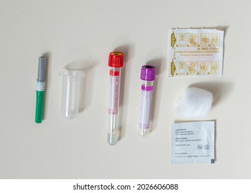 Pathology tubes with a tube holder, needle and swabs.