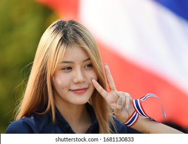 Pathumthani, Thailand - Jan 18, 2020 : Thai Women Football Fans Cheering In During AFC U-23 Championship Thailand 2020 Match Between Thailand And Saudi Arabia At Thammasat U. Stadium