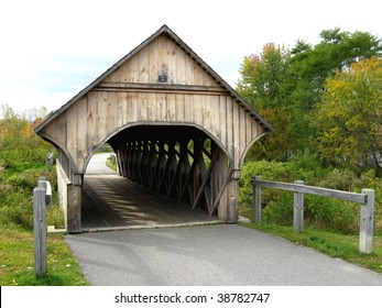 A Pathway Covered Bridge In Bethel Maine