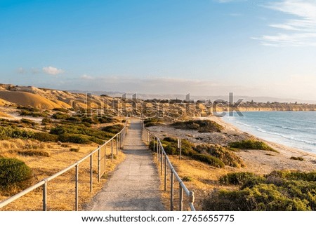 Pathway leading down to the beach at Blanche Point Cove during sunset on the Fleurieu Peninsula, South Australia.