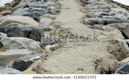 Pathway madeup of stone at beach