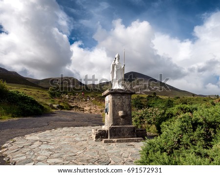 Pathway start with statue to Croagh Patrick in Westport Ireland