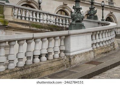 Pathway with white handrail leading to the Entrance to The opera house Palais Garnier. Architectural details of The Palais Garnier (Opera National de Paris). Place de l'Opéra (Opera Garnier).