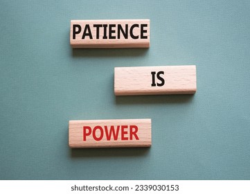 Patience is Power symbol. Concept words Patience is Power on wooden blocks. Beautiful grey green background. Business and Patience is Power concept. Copy space. Concept word
