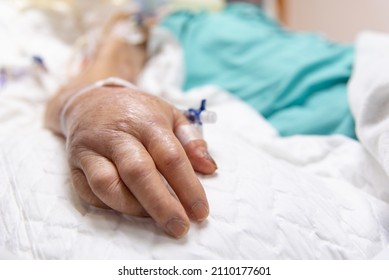 Patient Asian Elder Women 80s Flu Covid19 On Patient Bed With Incontinent Pad And Elderly Patient Hand In Intensive Care Unit (ICU.) Room At Hospital In Concept Healthcare In Life