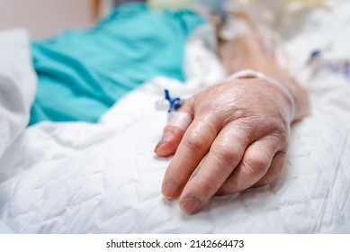 Patient Asian Elder Women 80s Flu Covid19 On Patient Bed With Incontinent Pad And Elderly Patient Hand In Intensive Care Unit (ICU.) Room At Hospital In Concept Healthcare In Life