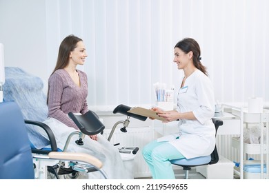 Patient communicating with gynecologist during private medical consultation - Shutterstock ID 2119549655