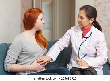 Patient Complaining  To Doctor About  Abdominal Pain At  Hospital 