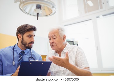 Patient Consulting A Doctor In The Hospital