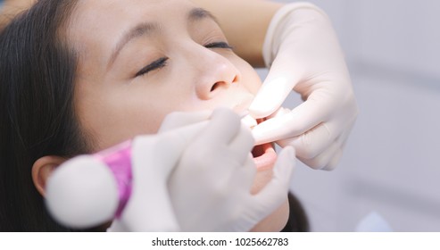 Patient In The Dental Chair And Undergo The Dental Check Up 