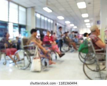  Patient Disable Paralysis Disease On Wheelchair.office Nurse Emergency Room In Hospital Waiting Consult Medical And Treatment ,concept Health Care Management Physician.blur Image. 