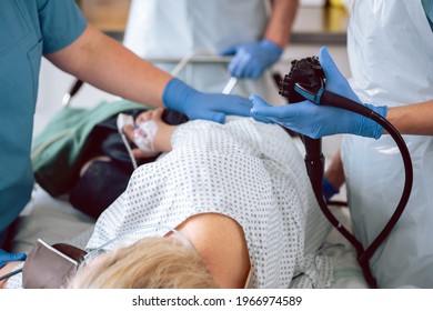 Patient and doctor in hospital during colonoscopy